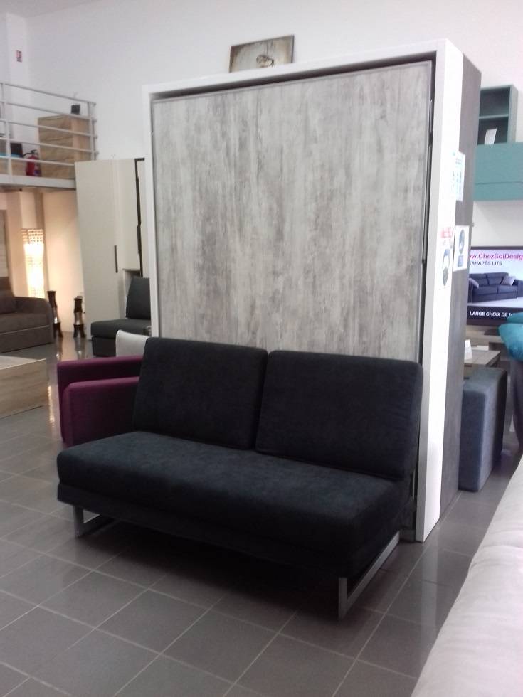 DESTOCKAGE A - 43% !!! sur ce lit escamotable et son canapé fixe synchronisé.