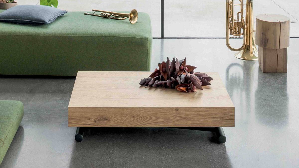 Modèle de table basse 100x68 relevable avec allonges intégrées livraison possible à Saint Tropez dans le Var